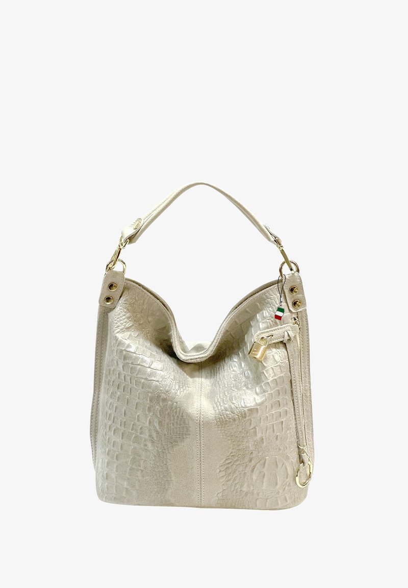 Beige krokodillenprint handtas met een gladde afwerking, een gebogen bovenkant, een enkele schouderband en gouden accenten, met een zijritszak.