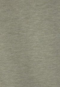 Light green cotton fabric, featuring a soft, smooth texture with a subtle heathered pattern throughout.