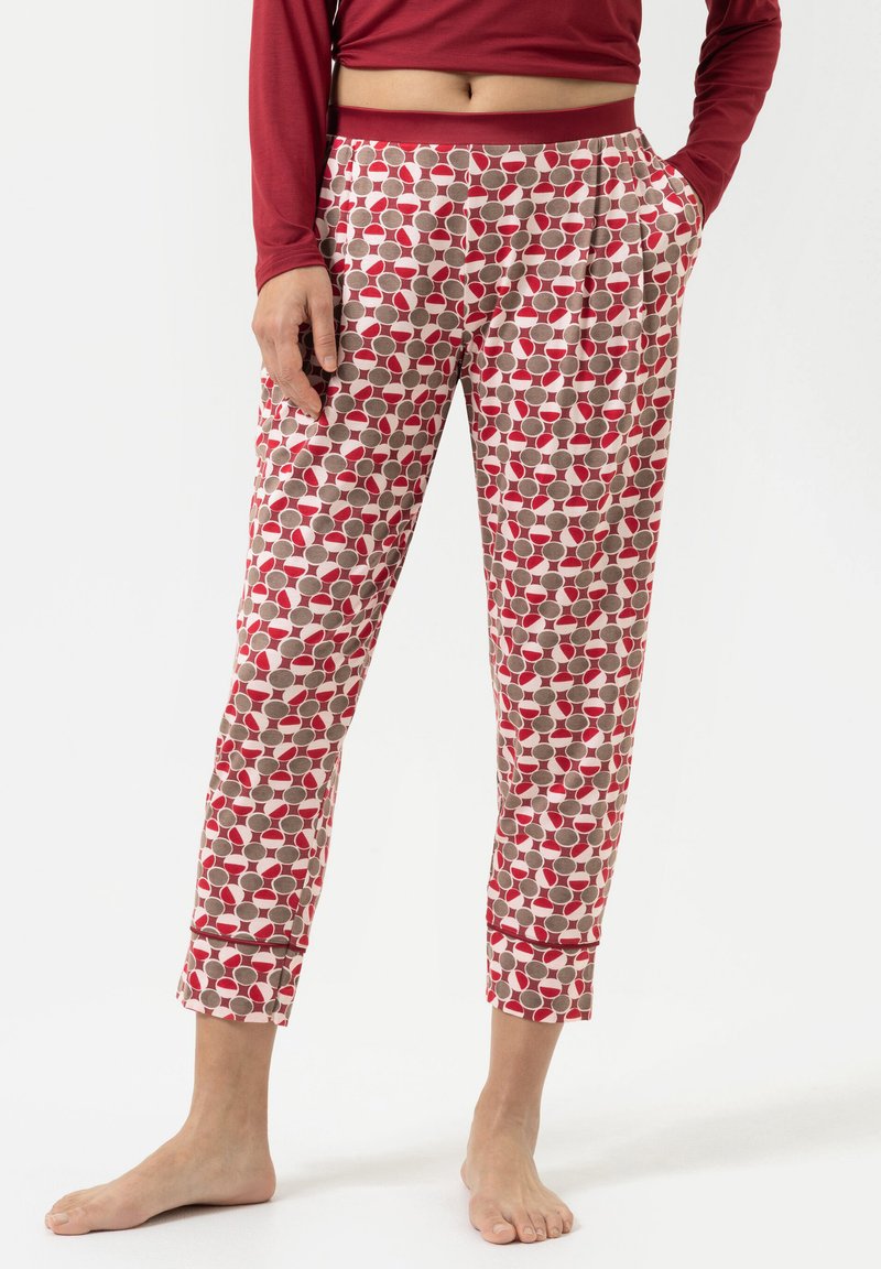 Katoenen pyjamabroek met een veelkleurig cirkelpatroon in rood, beige en grijs. Voorzien van zijzakken en een aansluitende taille.