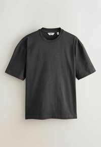Dark gray short-sleeve t-shirt made of soft cotton fabric. Features a round neckline and relaxed fit with no visible patterns or accents.