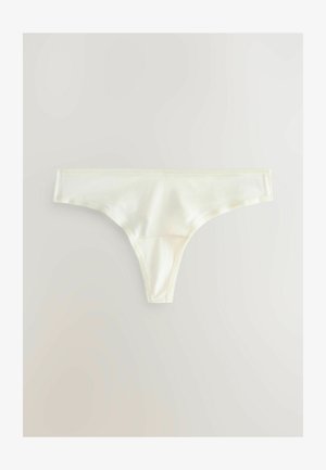 Satin-Tanga in blassgelb mit glatter Textur, minimaler Abdeckung und zarter, gewellter Borte entlang des Taillenbunds.