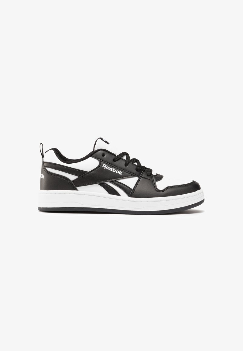 Μαύρα και άσπρα sneakers Reebok με λείο δερμάτινο πάνω μέρος, στρογγυλή μύτη, μαύρες κορδόνες και λευκή μεσαία σόλα με υφή.