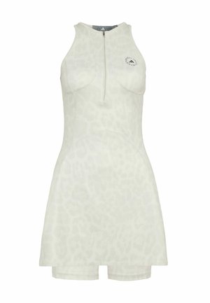 Robe de sport sans manches beige clair avec imprimé léopard subtil, fermeture éclair à l'avant et petit logo de marque sur le côté gauche de la poitrine.