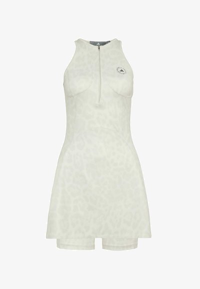 Ärmelloses, hellbeiges Sportkleid mit dezentem Leopardenmuster, Frontreißverschluss und kleinem Markenlogo auf der linken Brust.