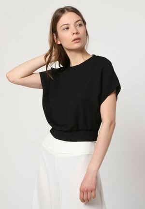 Outfitters Nation, BLUSA MANGA MURCIÉLAGO FLUIDA CUELLO REDONDO - Blusa - black
