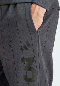 adidas Originals TRACK - Pantaloni de trening - multicolor dark grey heather