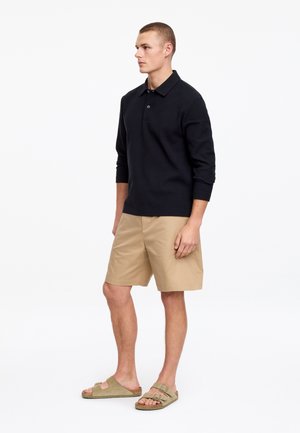 Rank 4: ARKET - WAFFLE - Polo shirt
