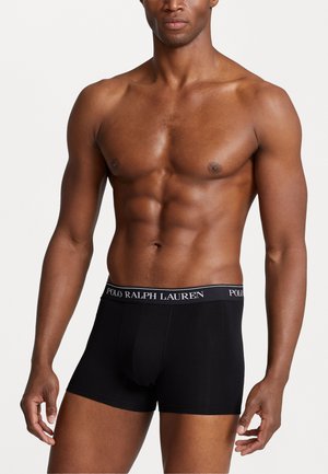 Schwarze Boxershorts aus Baumwolle mit elastischem Bund, der das Logo "POLO RALPH LAUREN" in Weiß zeigt, entworfen für Komfort und Passform.