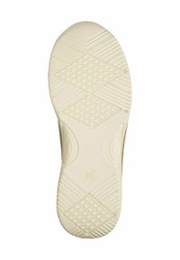 Semelle de chaussure en caoutchouc, couleur ivoire, avec un motif de grip texturé présentant des formes de diamant et de vagues ; bords courbés pour un ajustement ergonomique.