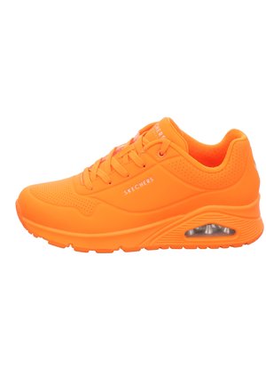 Bright orange Skechers athletic sneaker with laces, cushioned sole, and visible air pocket on white background.