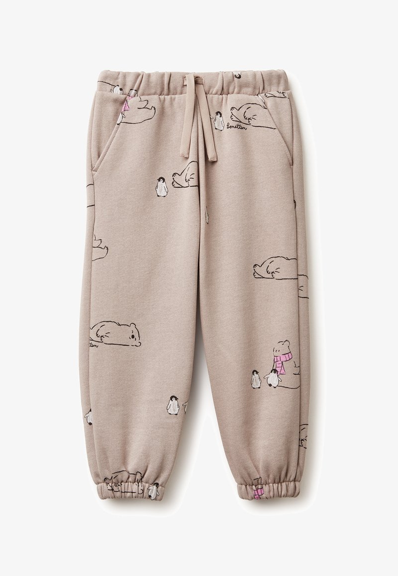 Beige tepláky s elastickým pasem, zdobené černými kreslenými medvědy a tučňáky v různých pózách. Manžety mají těsný střih.