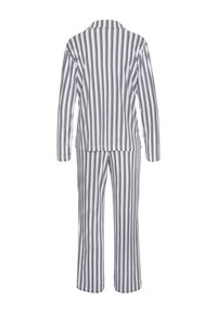 Striped pajama set in white and navy blue, featuring a long-sleeve buttoned shirt and loose-fitting pants with straight legs.