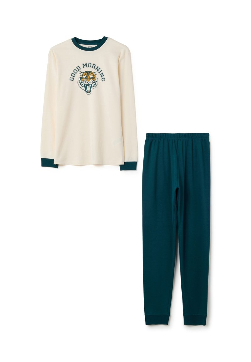 Conjunto de pijama de pantalones en verde oscuro con cintura elástica, compuesto por una camiseta de manga larga color crema con el gráfico de un tigre y la frase "BUENOS DÍAS".