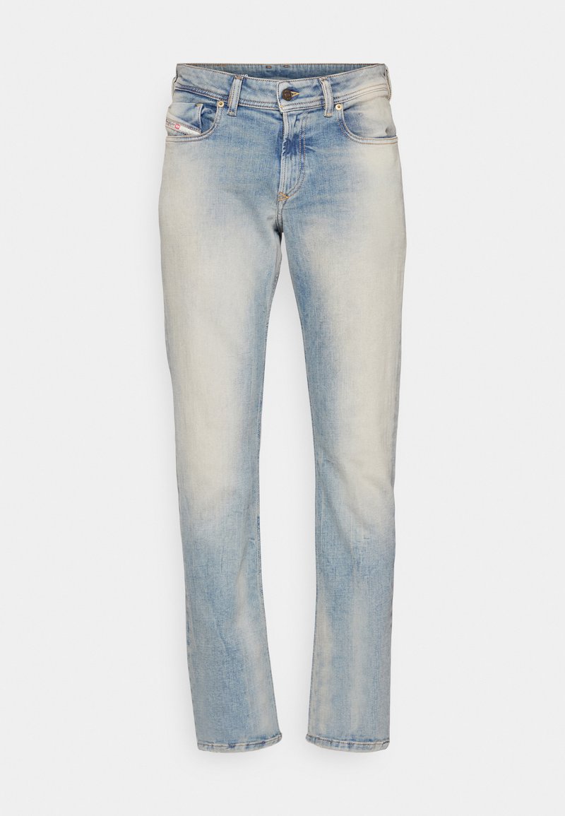 Lichtblauwe denim jeans met een vervaagde afwerking, vijf zakken en een knoopsluiting. Rechte snit met subtiele wassing en stikdetails.