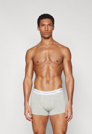 Szürke pamut boxer alsónadrág fehér rugalmas derékrésszel, amelyen szürke "JACK & JONES" felirat található. A dizájn testhez simuló, sima tapintású.