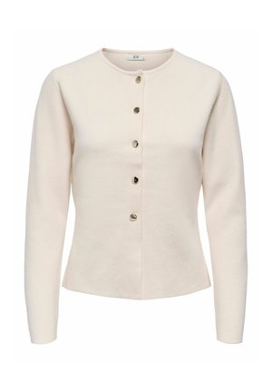 Ljus beige cardigan med långa ärmar, rund halsringning och en rad av fem knappar i silverfärg nedtill i mitten. Mjuk, texturerad tyg.