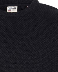 Dunkelblauer Strickpullover mit strukturiertem Muster und einem gerippten Rundhalsausschnitt. Verfügt über ein Etikett im Inneren mit dem Markennamen.