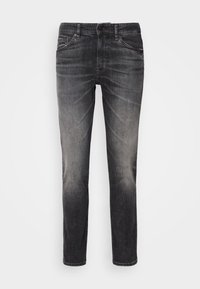 Jean slim noir délavé pour homme avec cinq poches et fermeture par bouton, présenté de face sur fond blanc uni.