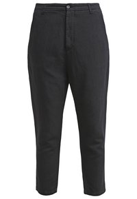 Černé lněné kalhoty se střihovým střihem, vybavené zapínáním na knoflík, poutek na opasek a bočními kapsami. Hladká textura a délka dosahující ke kotníkům.