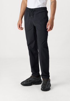 TRAVEL UNISEX - Pantaloni - black pure