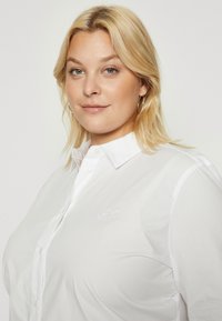 tommy hilfiger wendeblouson