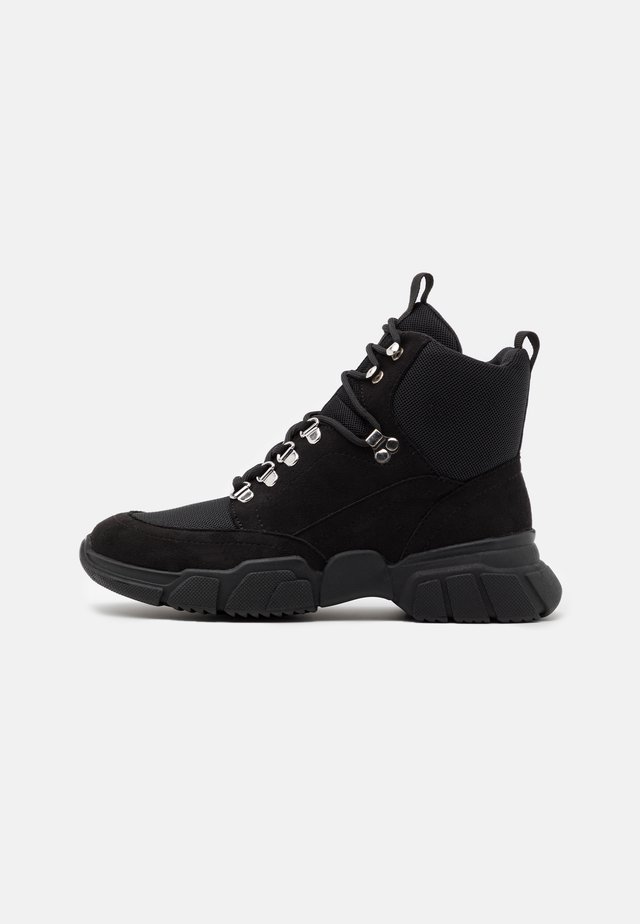 Ankle boots - black