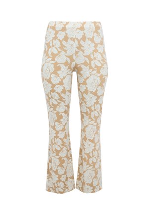 Hoch taillierte beige Hose mit weißem Blumenmuster, eng anliegend an Hüften und Oberschenkeln, leicht ausgestellt am Knöchel.