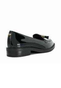Black patent leather loafer with a small block heel, tassel accent, and textured back panel. Features a round toe and subtle shine.