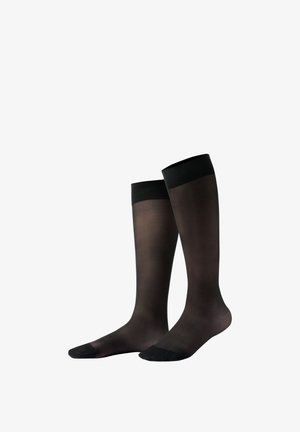 Pair of black knee-high sheer compression socks with reinforced toes and cuffs, displayed standing upright on a white background.