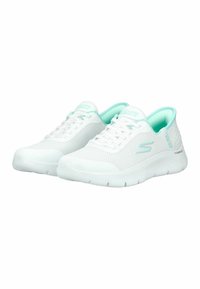 White athletic shoes with a mesh upper, mint green accents, and laces. Thick, flexible sole with a textured pattern for grip.