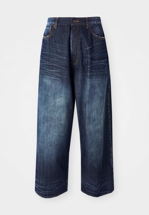 Dark blue denim wide-leg pants feature a high waist, contrast stitching, front pockets, and a smooth texture with slight fading.