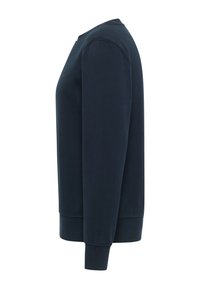 Sweatshirt bleu marine en tissu doux, avec un col rond, des manches longues, des poignets côtelés et un ourlet inférieur droit. Aucun logo visible.