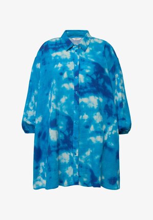 Overhemd in een oversized maat met een blauwe tie-dye patroon. Gemaakt van een gestructureerde stof met een omgeslagen kraag en lange, gepofte mouwen.
