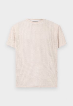 Svetlo bež majica s kratkimi rokavi s teksturiranim vzorcem in ohlapnim krojem. Okrogla izrezana vrhnja in mehak material, primerna za vsakodnevno nošenje.