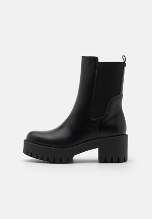 WARIN - Platform ankle boots - black