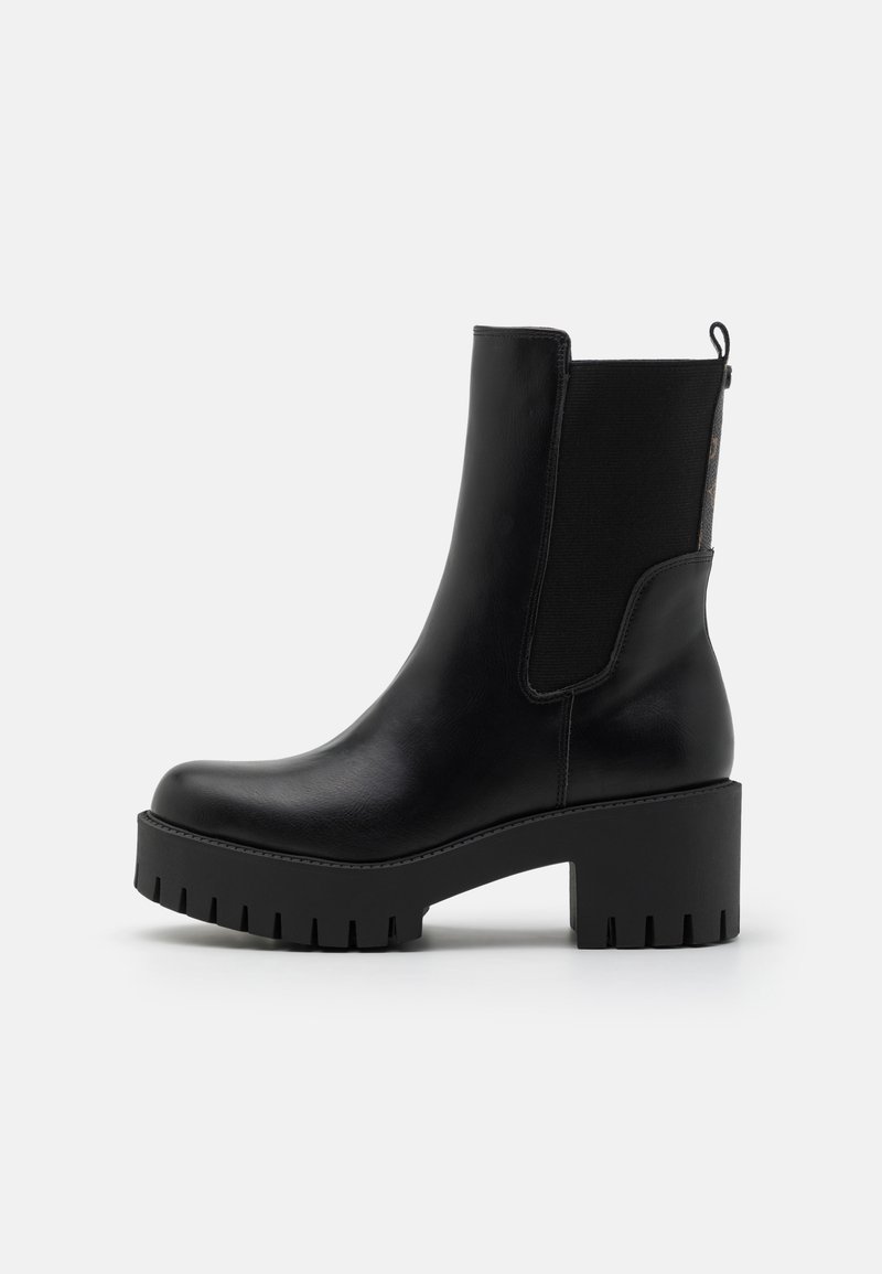 Black ankle boots made of smooth leather, featuring elastic side panels, a chunky heel, and a patterned accent on the back.
