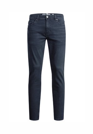 Ciemnoniebieskie jeansy slim fit wykonane z denimu o lekko przetartej teksturze. Posiadają kieszenie z przodu, zapięcie na guzik oraz szlufki na pasek.