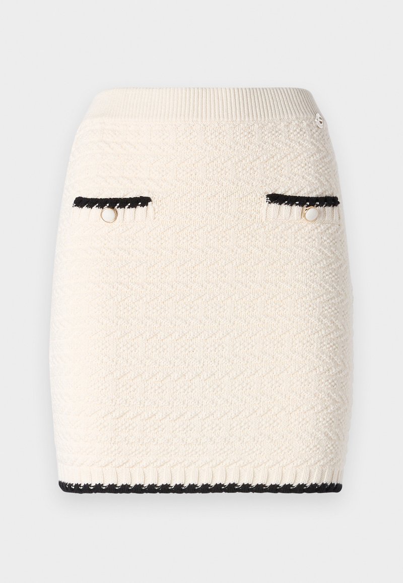 Dzianinowa mini spódnica w kremowym kolorze z teksturowanym wzorem w zygzak, ozdobiona czarnymi lamówkami przy kieszeniach i u dołu oraz złotymi elementami.