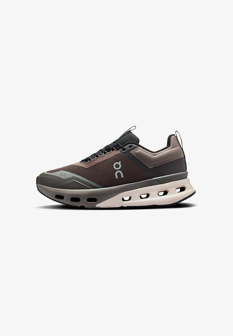 Gray and brown athletic shoe with a breathable mesh upper, rounded toe, and visible cushioning pods in the sole. Includes a pull tab.