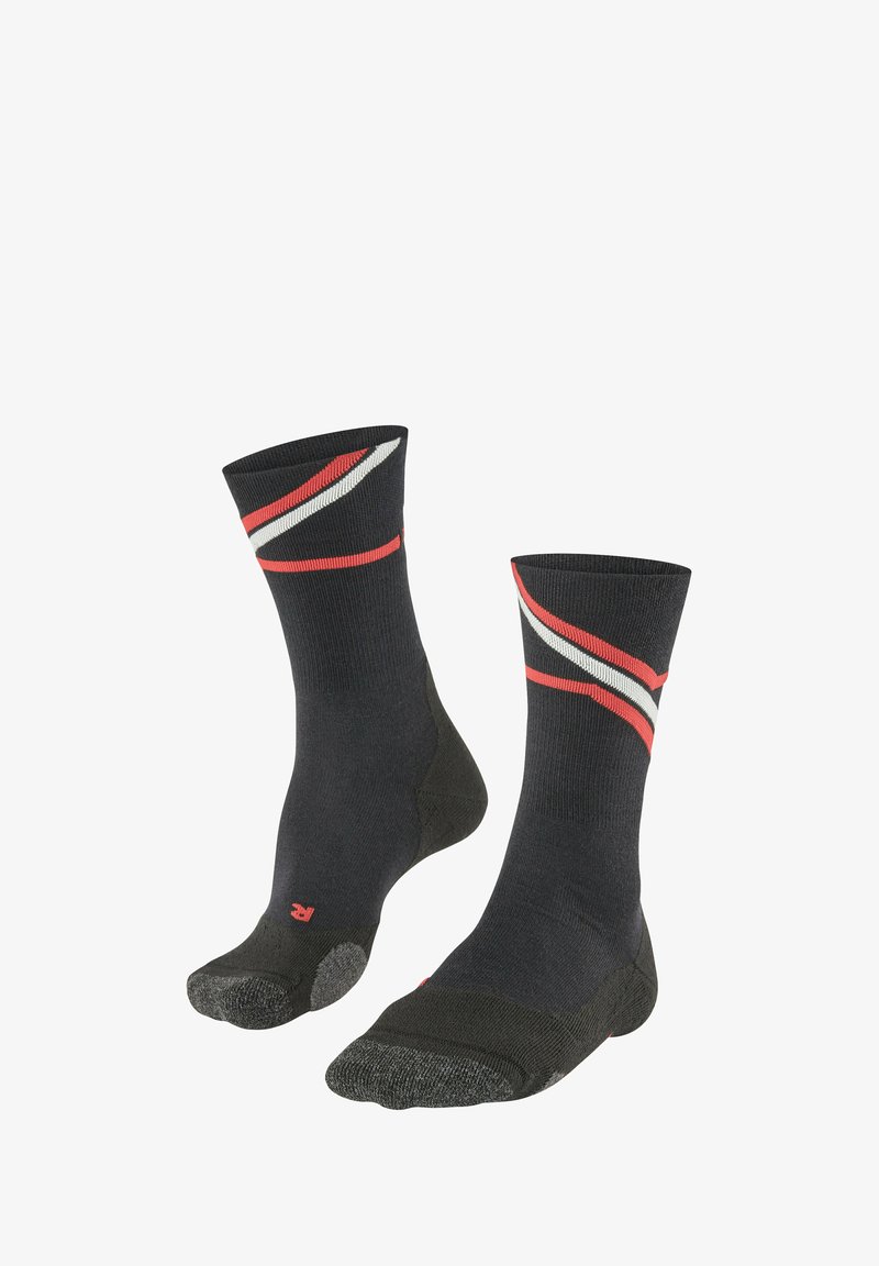 Calze nere con strisce diagonali rosse e bianche. Progettate con una texture a costine e una punta rinforzata, per garantire comfort e durata.