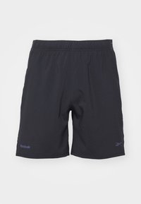 Fekete sportos rövidnadrág, könnyű szövetből készült, rugalmas derékkal, bal lábszáron a Reebok logo-val, és sima textúrával.