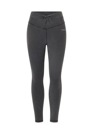 Leggings gris foncé avec un détail de taille twisté, fabriqués à partir d'un matériau extensible. Présentent des coutures contrastantes et un petit logo sur la hanche.