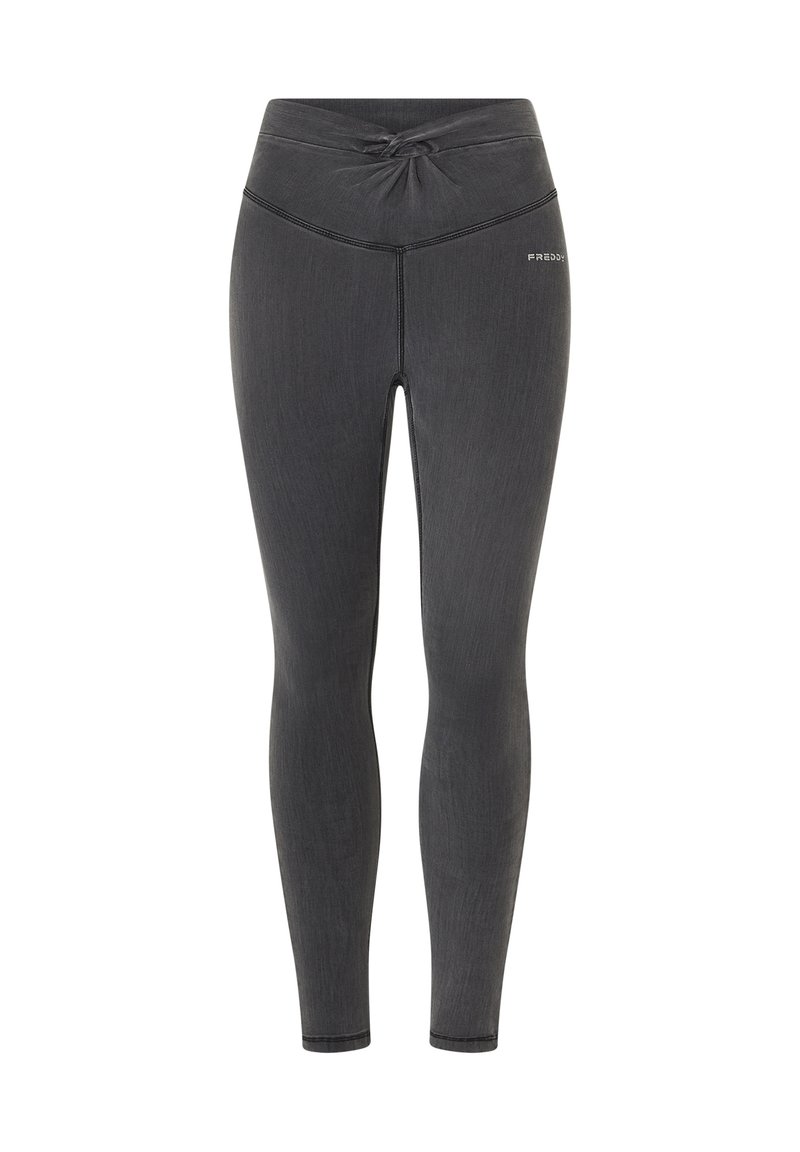 Leggings grigio scuro con dettaglio in vita torcigliato, realizzati in materiale elasticizzato. Presentano cuciture a contrasto e un piccolo logo sull'anca.
