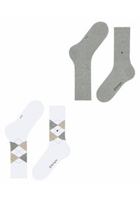 Zwei Paar Socken: ein einfarbiges graues Paar und ein weißes Paar mit einem Diamantmuster in Grau und Beige. Jedes hat ein einzelnes schwarzes Punktdetail.