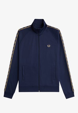 Marineblå lynlåstræningsjakke med gyldent laurbærlogo på brystet og matchende gyldne laurbærstriber langs ærmerne.