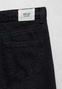 Mango Kids Flared jeans - black denim