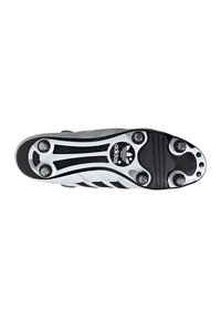Black and white soccer shoe sole featuring six metal studs, smooth rubber texture, and contoured design with Adidas logo.