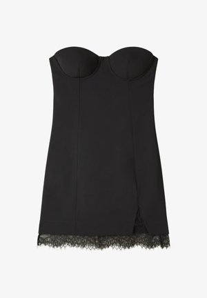 Miniabito nero senza spalline con scollo a cuore, busto strutturato, spacco laterale e rifinitura in pizzo all'orlo.
