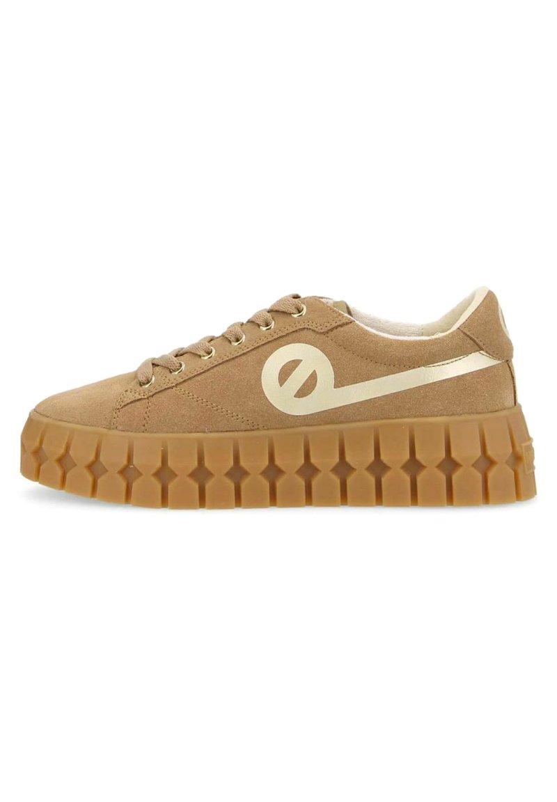 Tan suede sneaker with a chunky rubber sole. Features a metallic gold accent and rounded laces. Side logo in gold, textured sole pattern.