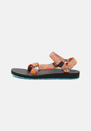 Kleurvolle sandalen met patronen op de nylon banden, verstelbare sluitingen en een zwarte, gestructureerde zool. Beschikt over een lichtblauwe loopzool voor grip.